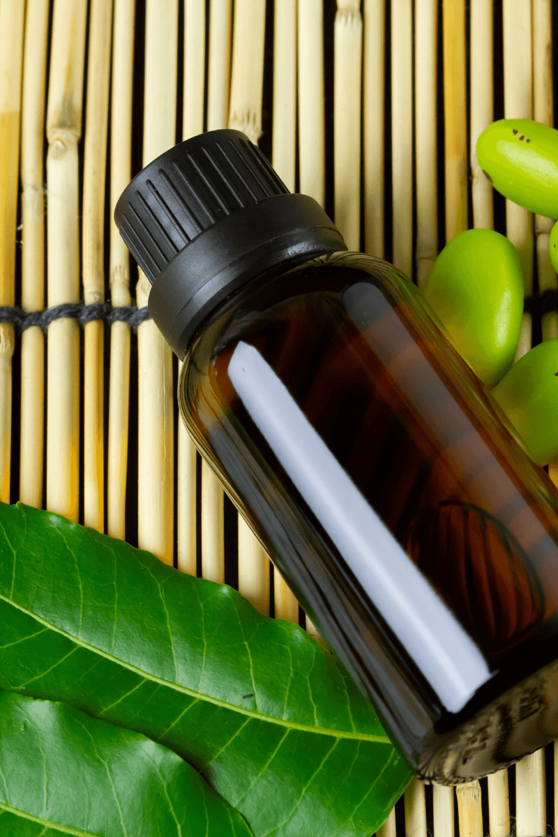 Homemade neem toner in a glass bottle for acne-prone skin | skincaresolutions.in