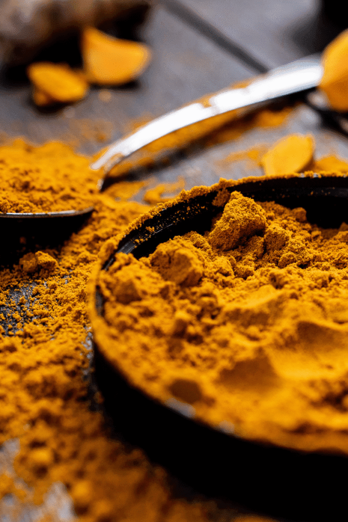 Close-up of bright yellow turmeric powder for natural skin brightening remedies | skincaresolutions.in