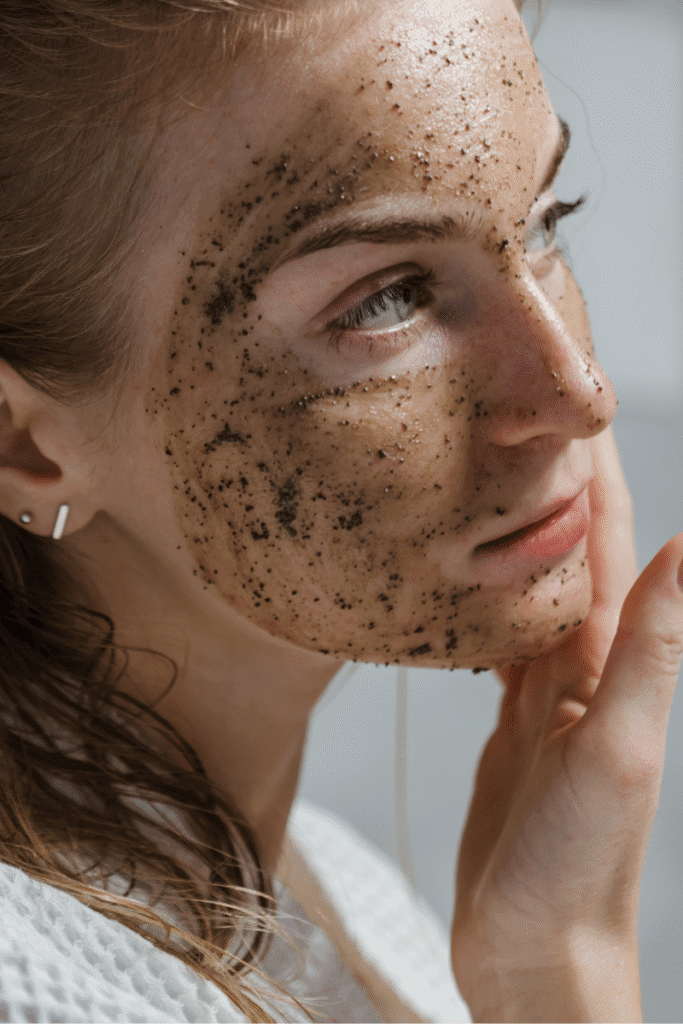 Coffee face mask DIY  . Woman applying a coffee face mask DIY for puffy tired skin | skincaresolutions.in